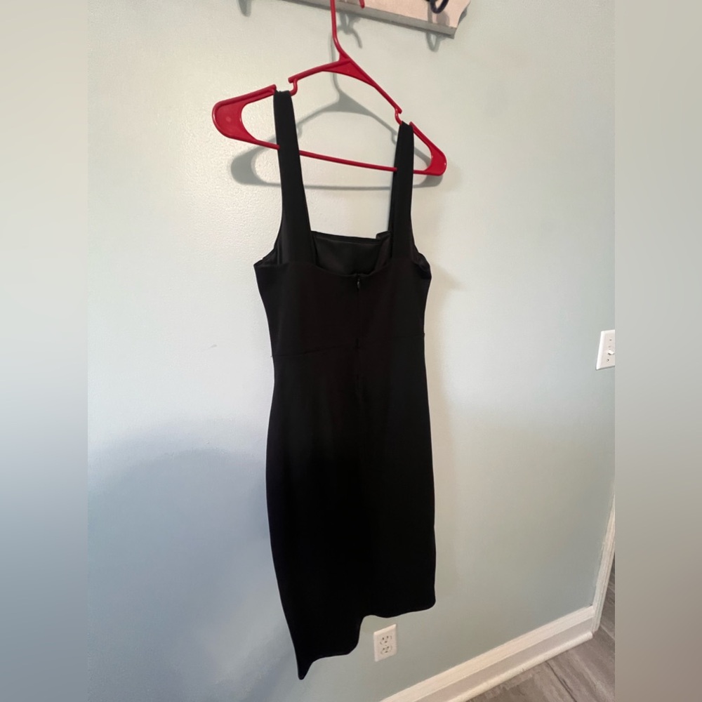 Lulus black dress. Never worn. Never washed.